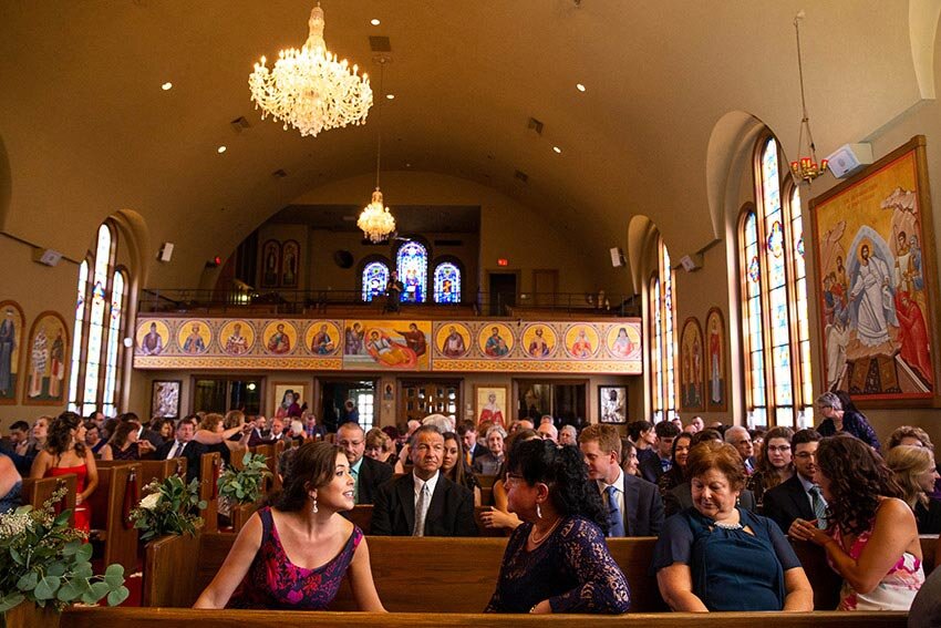 Guests Arrive at Greek Orthodox Wedding