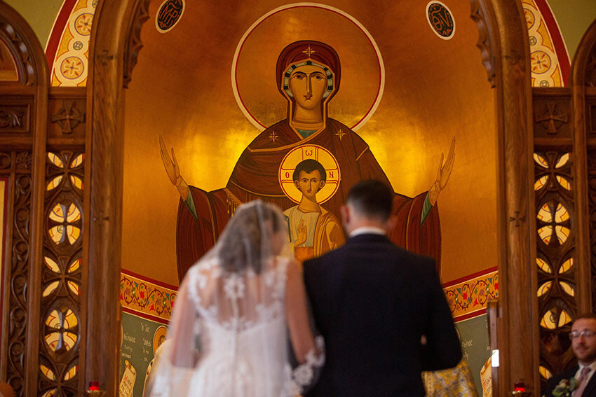 Bride &amp; Groom at the altar - Greek Orthodox Wedding