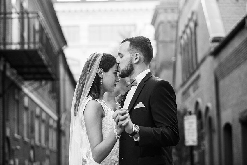 Black and white of bride &amp; groom at Lancaster Central market