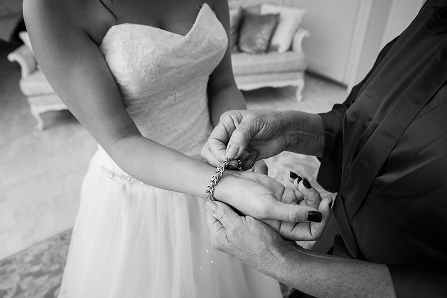 Detail of Bride Getting Bracelet on
