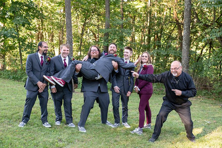 Groom with his groomsmen and groomswoman