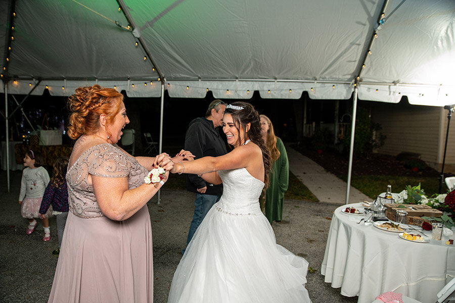 Mother of the Groom dances with the bride