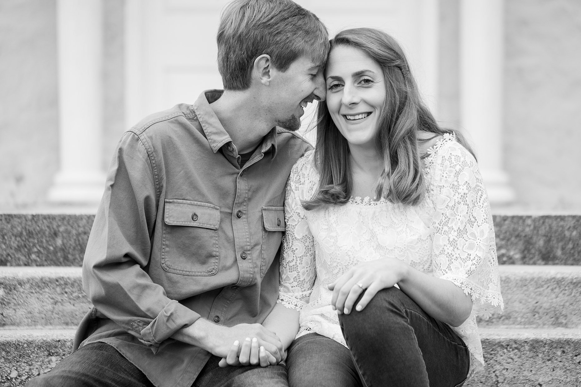 Black and white portrait of couple nuzzling