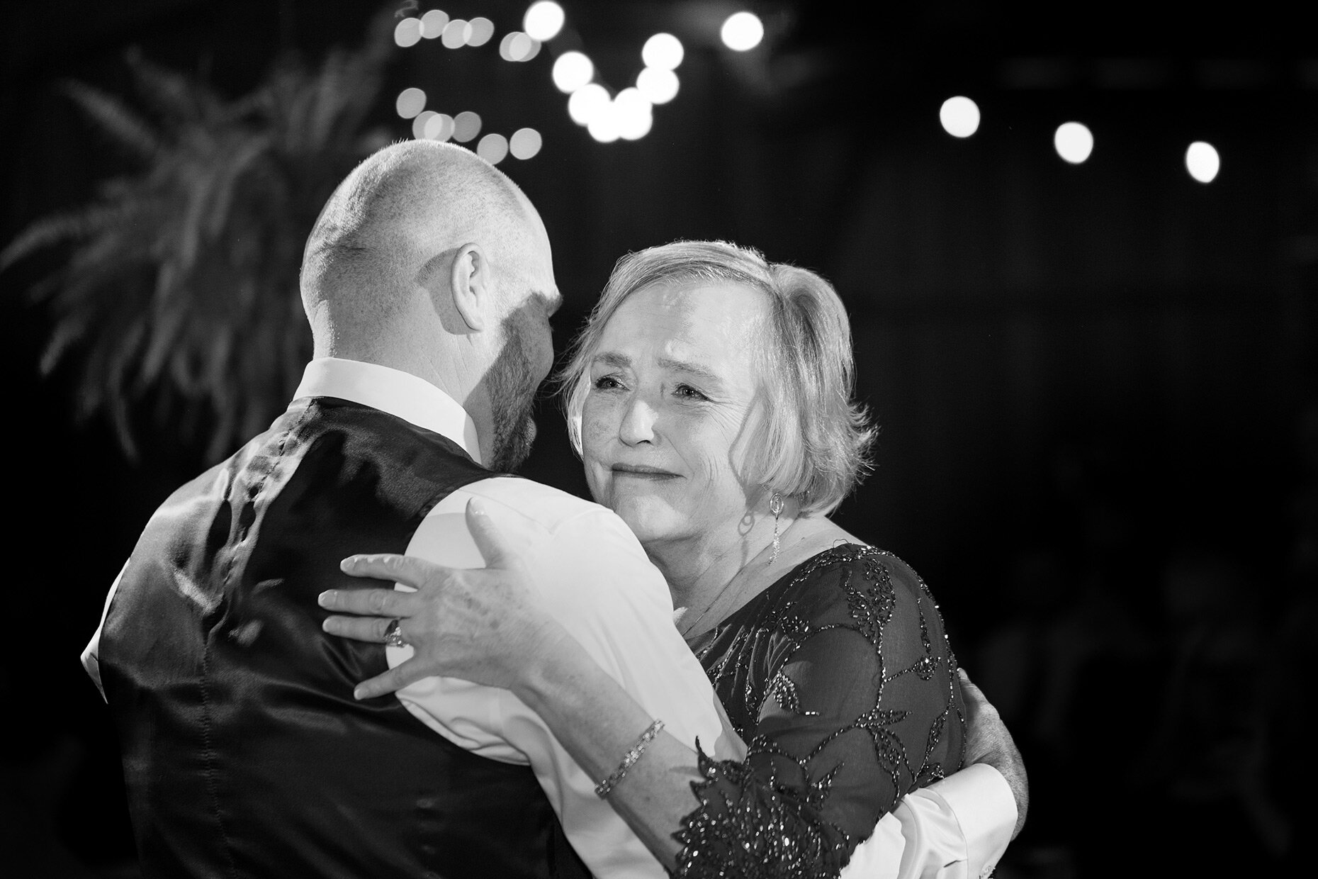 Mother of the groom crying at first dance