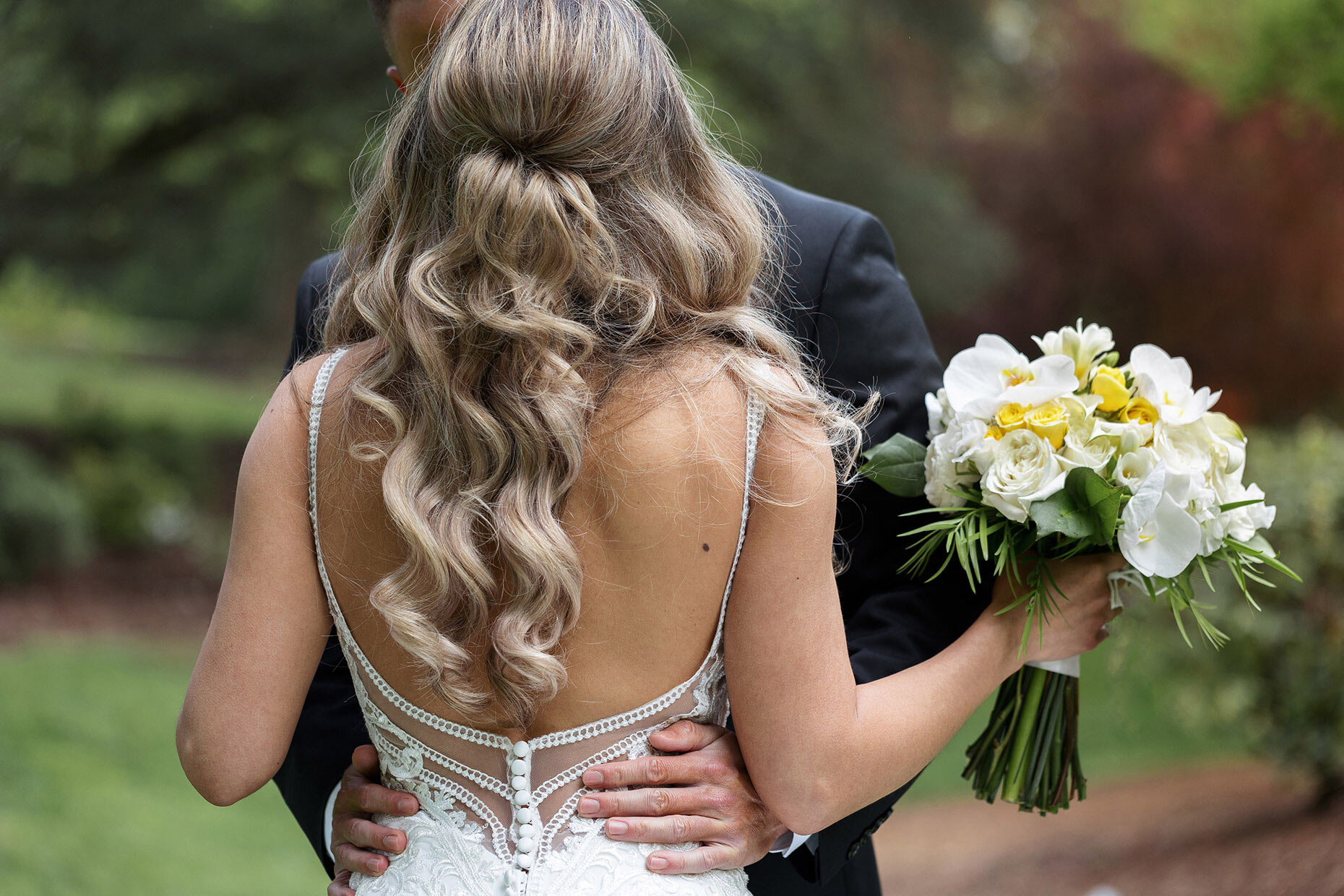 Back of Bride's dress and bouquet details
