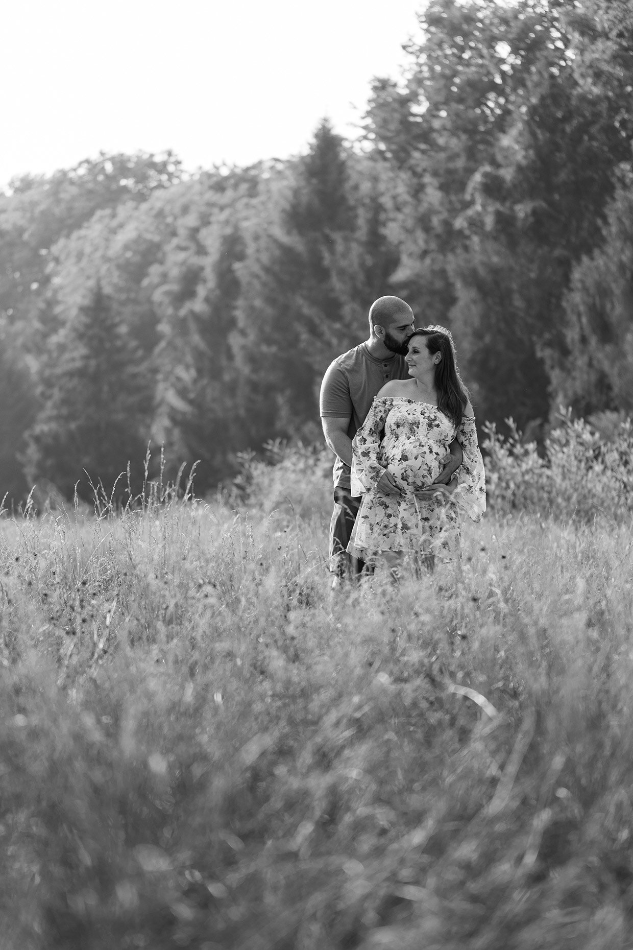 Black and white grassy field maternity session