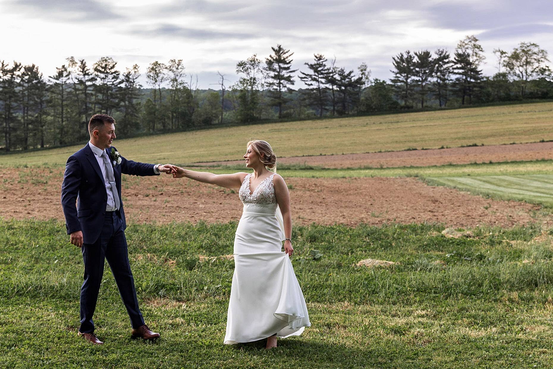 Bride &amp; Groom dancing in a field Couple Photos Lily Manor Wedding Central Mifflin, PA 