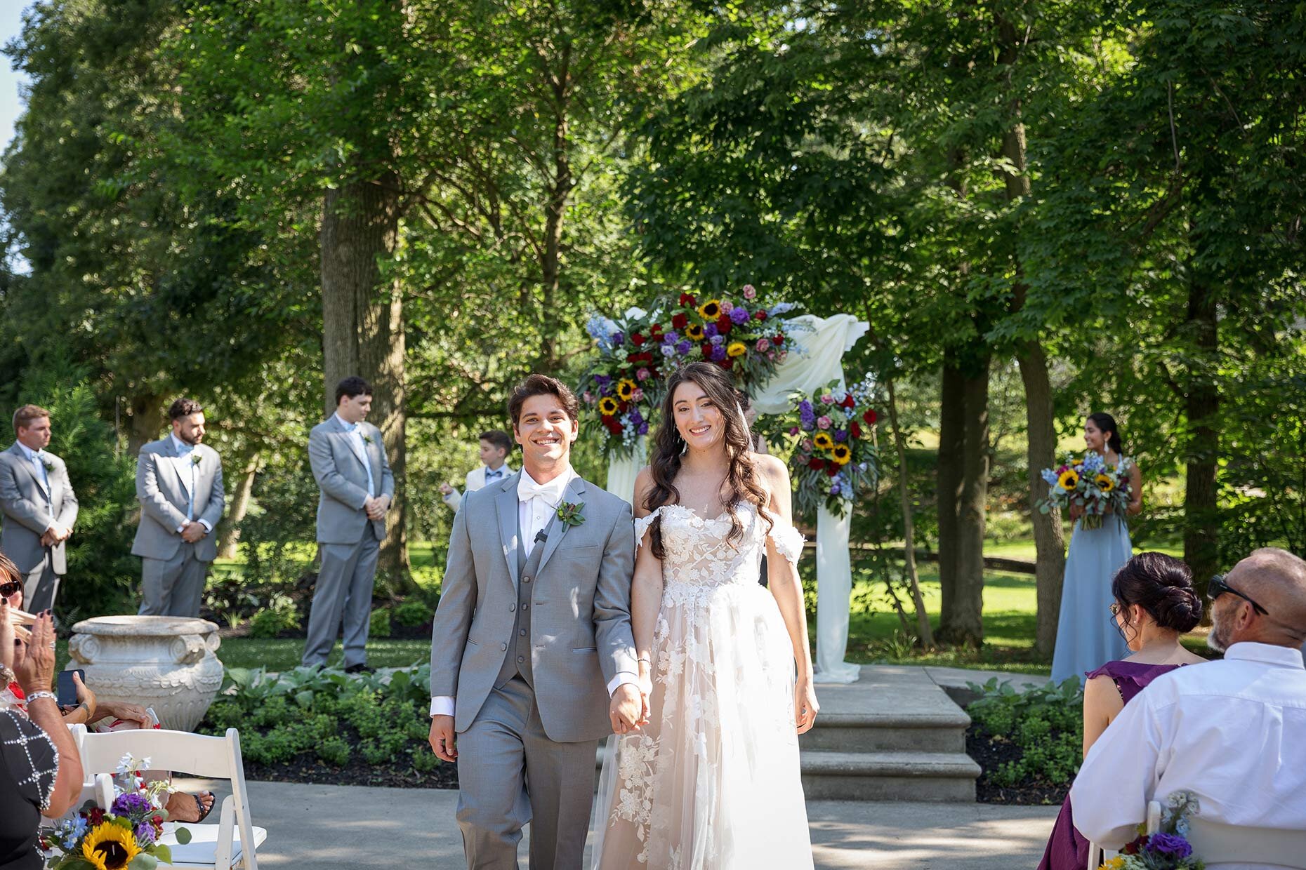 Recessional bride and groom walking down the aisle