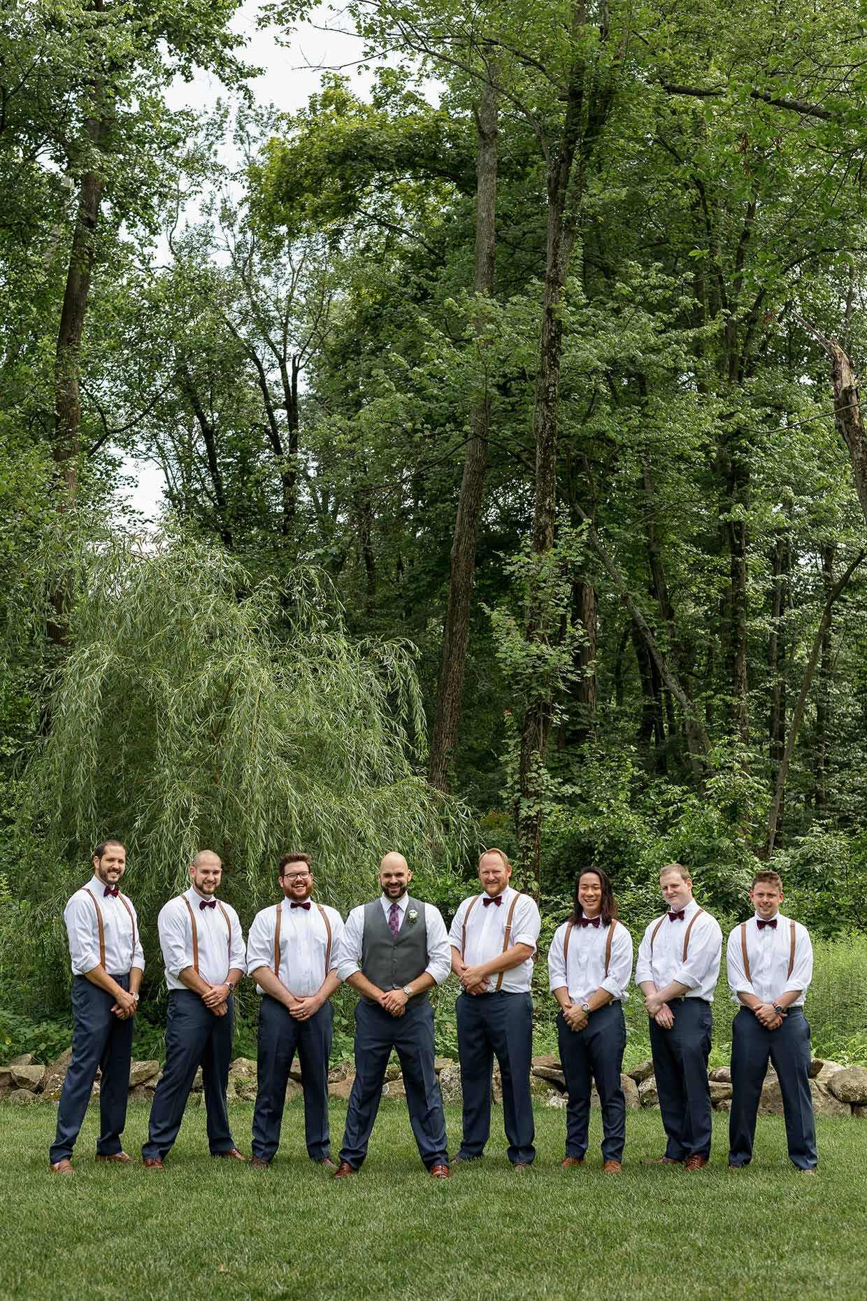 Groomsmen lined up so serious! 