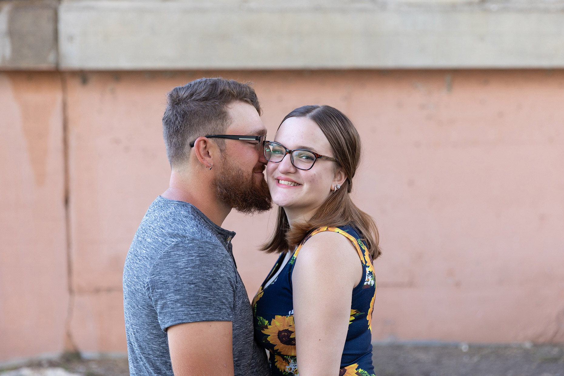 Engagement Photos with pink wall