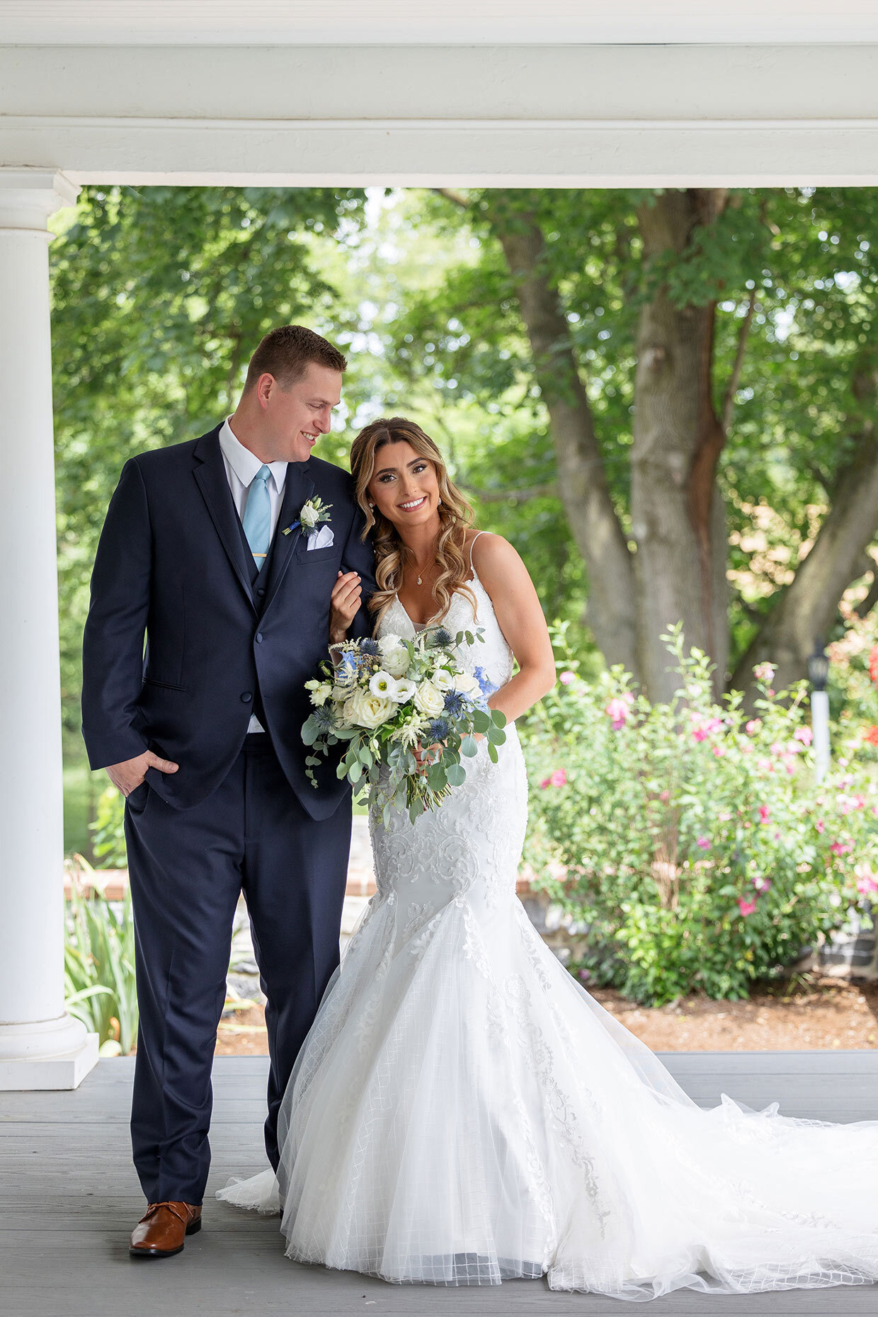Couple Portrait of Bride and Groom on front porch