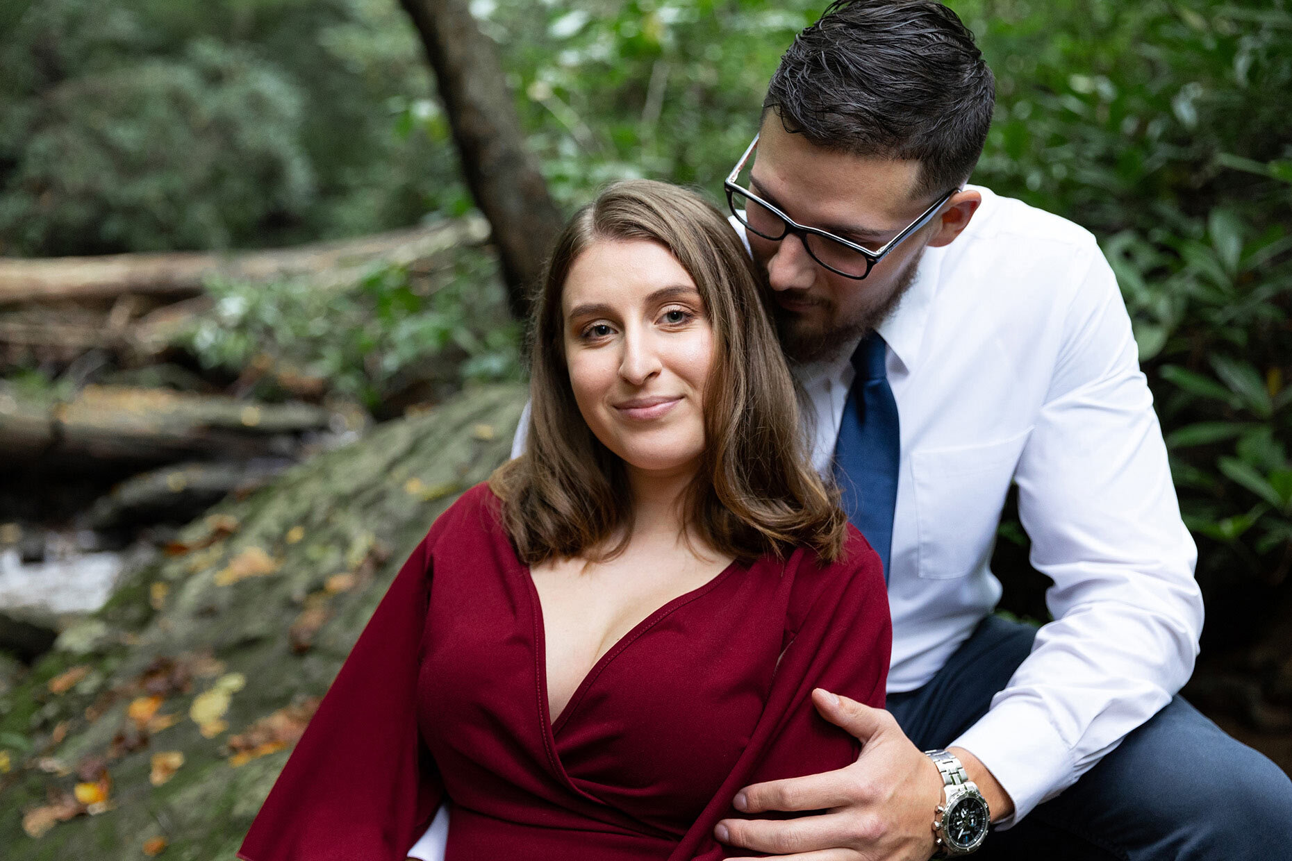 Couple in the woods for their engagement portraits