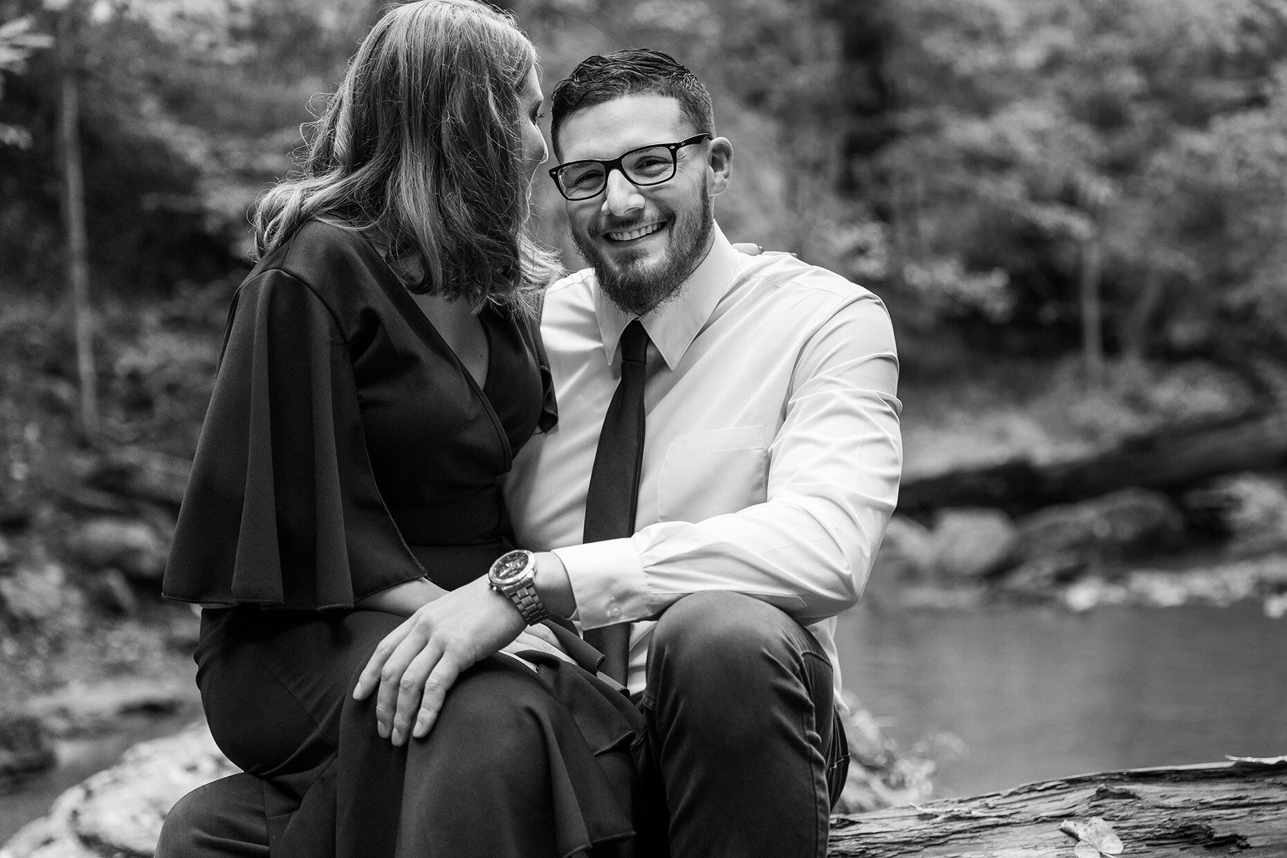Couple laughing at engagement session