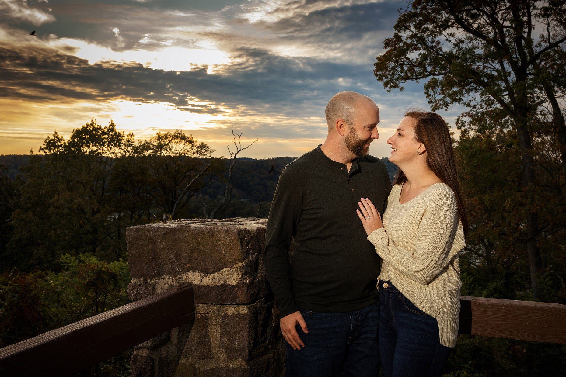 Hawks flying at overlook during sunset engagement session