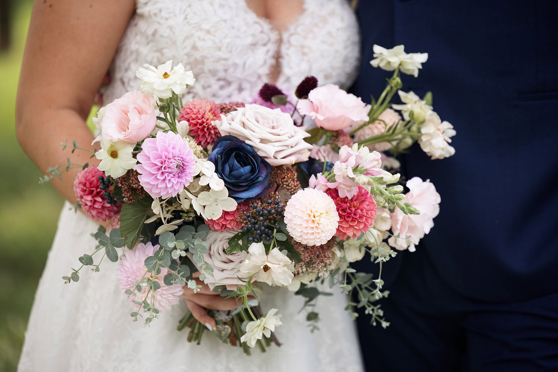 Close up of Bride's Bouquet with Pink and blue Flowers