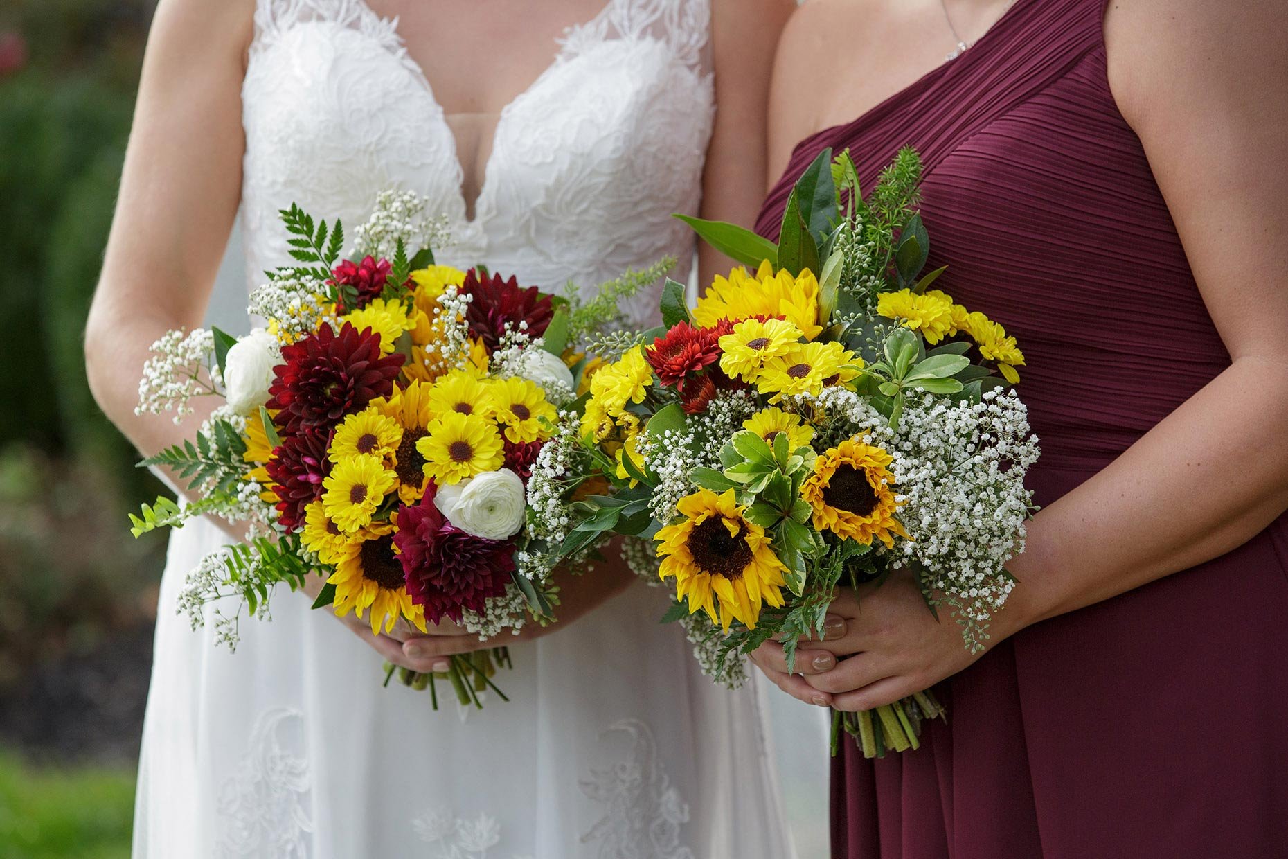 Bride &amp; Bridesmaid's bouquets with Red &amp; Yellow Flowers