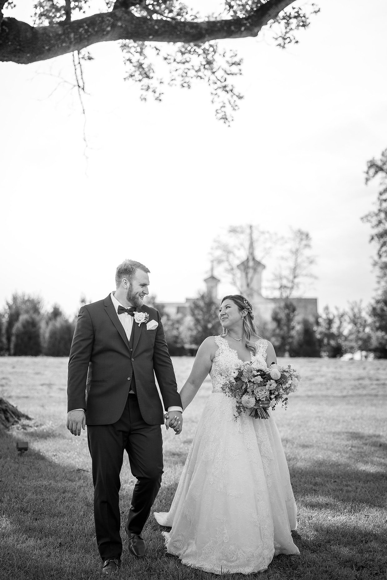 Bride &amp; Groom Walking in Black and white