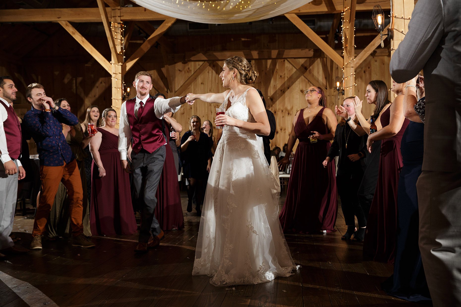 Groom dancing with bride at reception