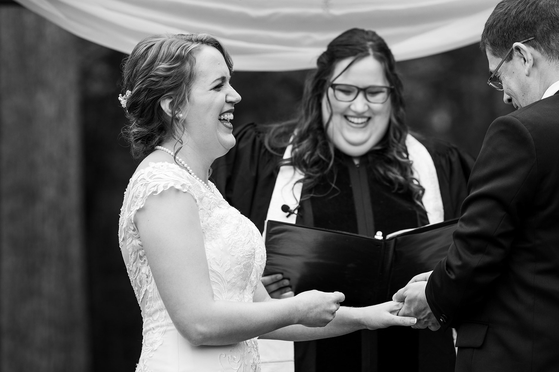 Bride laughing at Ceremony