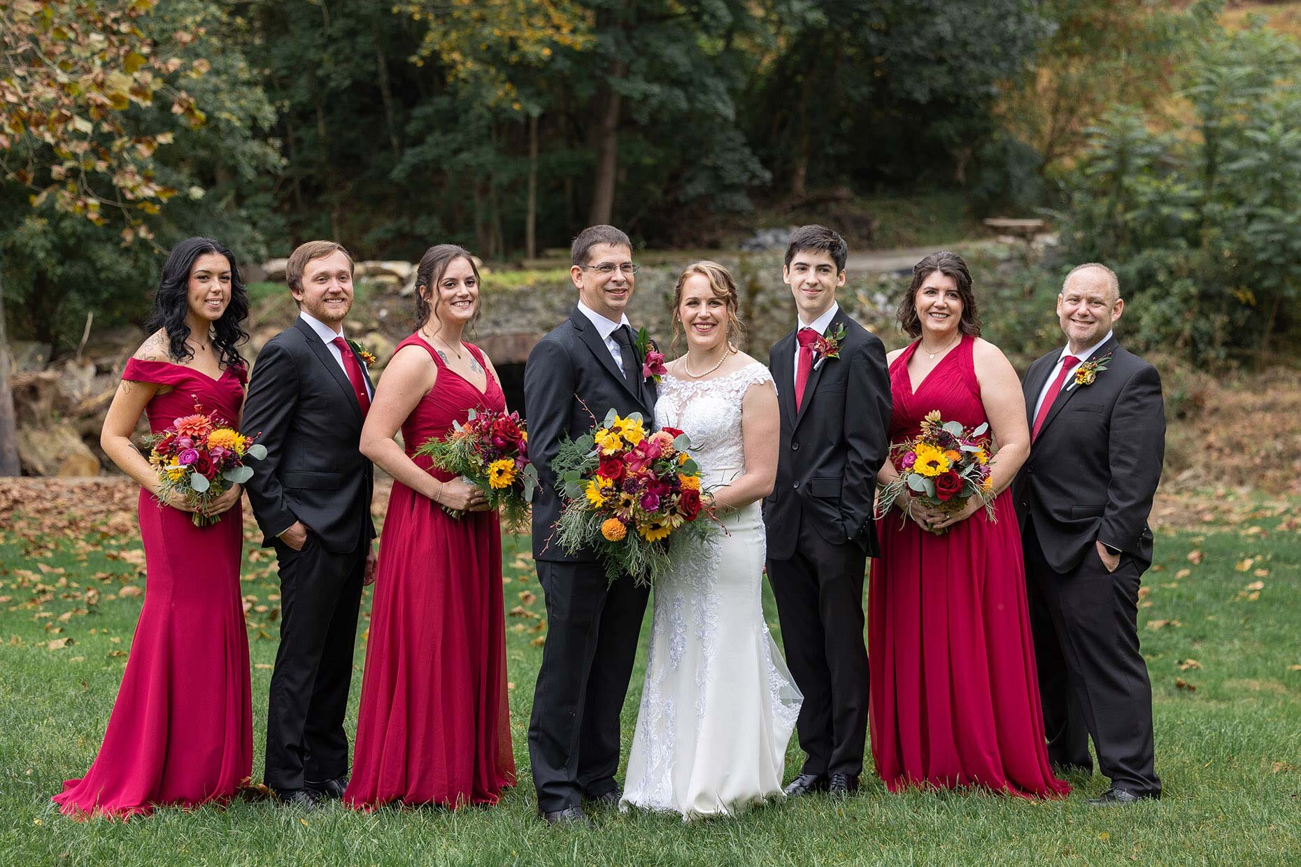 Bridal party in red and sunflowers