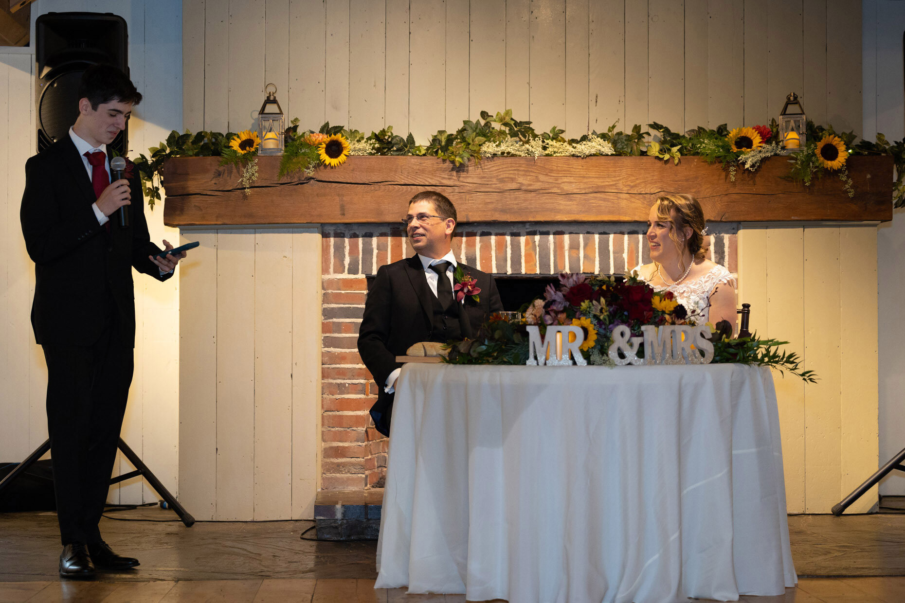 Son of Groom gives toast at reception 